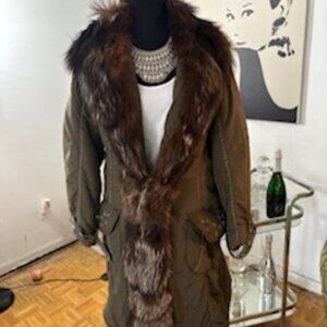 Fur trimmed down coat from Italy.